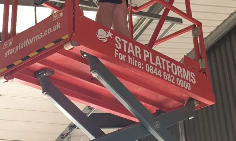 Star Platforms Provide a Skyjack 3219 Electric Scissor Lift to Complete Fire Alarm and Detection System Installation