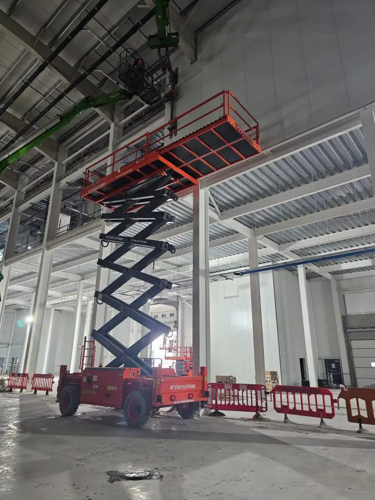 what are access platforms Example of a powered access platform: electric scissor lift for vertical indoor tasks