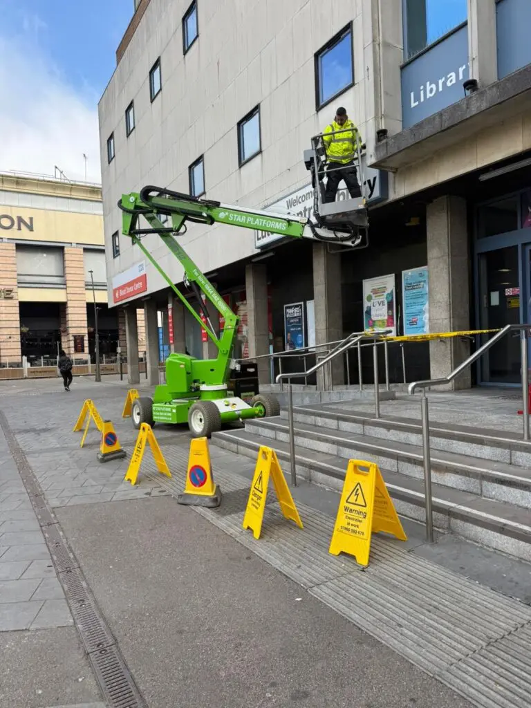 an operator on a boom lift in luton