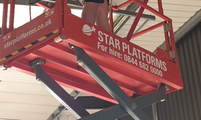 Star Platforms Provide a Skyjack 3219 Electric Scissor Lift to Complete Fire Alarm and Detection System Installation